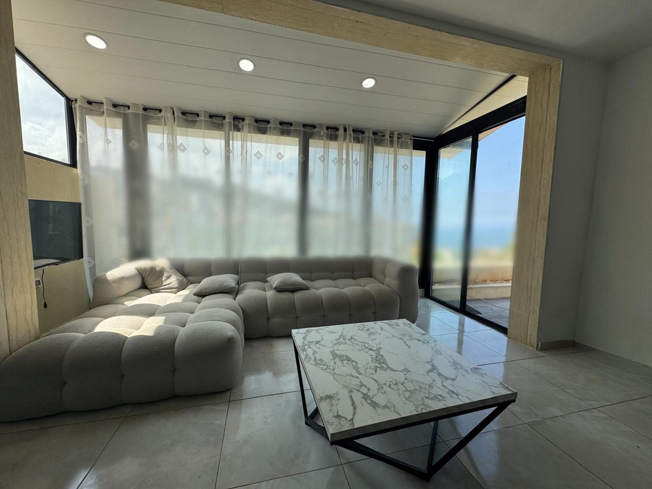 Ref (JZ10.A.407)

A decorated furnished 100 m2 apartment having an open mountain/sea view for sale in Blat

This property consists of the below:

-Surface area : 100 sqm
-Terrace: 100 sqm 
-Price: 127,000$ (cash) 
- Bedrooms: 2
- Bathrooms: 2
- Living rooms: 1
- Dining rooms: 1
- Parking spots: 2 (Underground) 

- Features : 
*Sea View
*Mountain View
*Three Minutes From LAU
*High-end Finishing 
*Close To All Amenities 
*5 years 
*Prime Location
*Calm Area
*Double Wall
*Double Glass
*Electric Gate
*AC (Installation)
*Videophone 
*Decorated 
*Storage room 
*Electric shutters

Brokerage fees: 2.5 % in case of selling / 1 month rental value in case of rent. 

For more info, kindly contact us on 71 66 55 71 / 71 788 178 or message us on WhatsApp with your full name and the reference number of the property and we will contact you the soonest.

I SOLD is a member of the Real Estate Syndicate of Lebanon (REAL)

I SOLD (Lebanon), Zalka Highway, Zalka 690 Bld. 6th Floor

شقة مفروشة ومجهزة بديكورات مميزة بمساحة 100 متر مربع، تتمتع بإطلالة مفتوحة على الجبل والبحر، معروضة للبيع في منطقة 